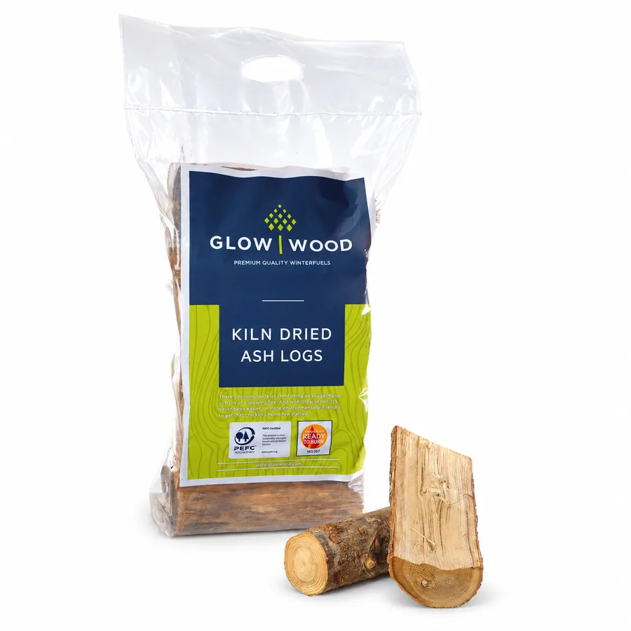 Glow Wood kiln dried ash logs in a retail bag, with split ash logs beside it